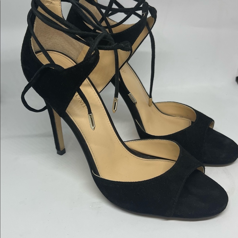 Size 9 Ivanka Trump leather upper high heels